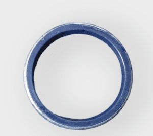 A close-up of the Case Construction 83931281 seal for backhoe bucket pin, showing its size and shape.